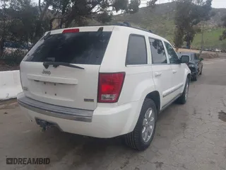 2009 Jeep Grand Cherokee Limited with VIN 1J8HR58P39C547341, listed as a IAAI auction lot 41792437 with 147,260 mi miles. Bid and sale history available at carsss.com. Image 4.