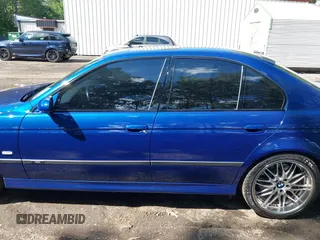 2002 BMW M5 z VIN WBSDE93452BZ99916, wystawiony jako IAAI lot #42346645 z przebiegiem 90 876 mil mil oraz . Historia ofert i sprzedaży dostępna na DreamBid. Obrazek 14.