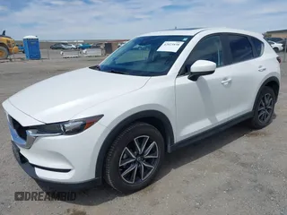 2018 Mazda CX-5 Touring with VIN JM3KFACM3J0381122, listed as a IAAI auction lot 42023838 with 76,121 mi miles. Bid and sale history available at carsss.com. Image 17.
