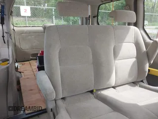 2005 Kia Sedona LX with VIN KNDUP132056702484, listed as a IAAI auction lot 42099572 with 195,528 mi miles and . Bid and sale history available at DreamBid. Image 8.