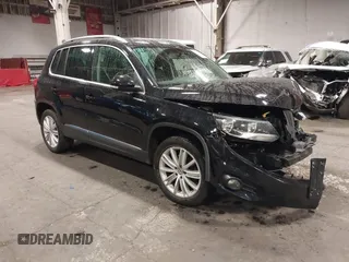 2014 Volkswagen Tiguan SE z VIN WVGAV3AX4EW528594, wystawiony jako IAAI lot #41777177 z przebiegiem 74 552 mil mil oraz . Historia ofert i sprzedaży dostępna na DreamBid. Obrazek 1.