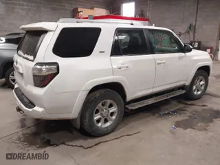 2014 Toyota 4Runner Limited with VIN JTEBU5JR1E5201256, listed as a IAAI auction lot 41674334 with 236,059 mi miles. Bid and sale history available at carsss.com. Image 4.