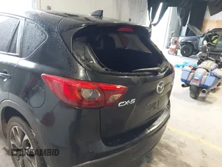 2016 Mazda CX-5 Grand Touring with VIN JM3KE2DY9G0705127, listed as a IAAI auction lot 41412910 with 181,993 mi miles. Bid and sale history available at carsss.com. Image 17.