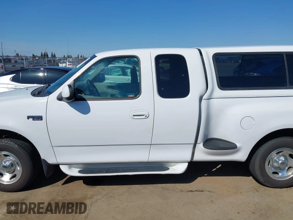 1998 Ford F-150 XL with VIN 1FTZX072XWKA12003, listed as a IAAI auction lot 41765328 with 119,445 mi miles and . Bid and sale history available at DreamBid. Image 14.