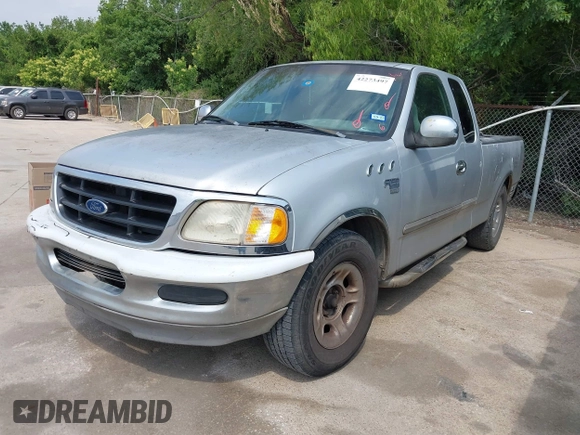 1999 Ford F-150 with VIN 1FTRX17W7XKB20640, listed as a IAAI auction lot 42273497 with 250,232 mi miles and . Bid and sale history available at DreamBid. Image 2.