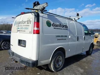 2017 Chevrolet Express Cargo Van with VIN 1GCWGAFF9H1176218, listed as a IAAI auction lot 41678884 with 218,451 mi miles. Bid and sale history available at carsss.com. Image 4.