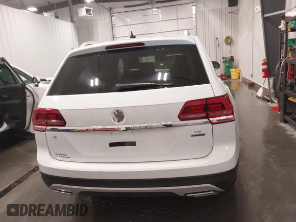 2018 Volkswagen Atlas SE with VIN 1V2KR2CA7JC574270, listed as a IAAI auction lot 41654110 with 104,440 mi miles and . Bid and sale history available at DreamBid. Image 17.