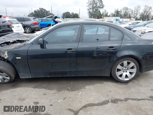 2007 BMW 5 Series 530i with VIN WBANE73577CM57997, listed as a IAAI auction lot 41461292 with 220,424 mi miles. Bid and sale history available at carsss.com. Image 14.