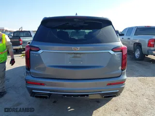 2020 Cadillac XT6 FWD Premium Luxury with VIN 1GYKPCRS8LZ129799, listed as a IAAI auction lot 41602536 with 96,865 mi miles. Bid and sale history available at carsss.com. Image 16.