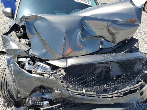 2018 Mazda CX-5 Grand Touring z VIN JM3KFBDM3J0351106, wystawiony jako Copart lot #52553925 z przebiegiem Nie podano mil oraz Szkoda całkowita • Salvage title. Historia ofert i sprzedaży dostępna na DreamBid. Obrazek 14.