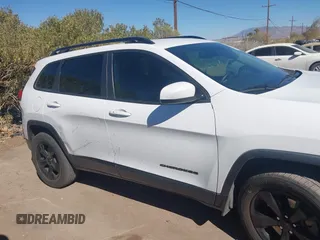 2016 Jeep Cherokee Latitude with VIN 1C4PJMCS9GW134769, listed as a IAAI auction lot 41668793 with 122,539 mi miles and . Bid and sale history available at carsss.com. Image 13.
