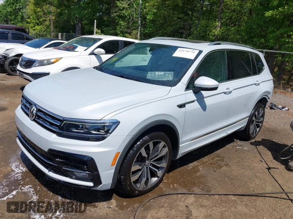 2019 Volkswagen Tiguan SEL Premium with VIN 3VV4B7AXXKM019995, listed as a IAAI auction lot 42170731 with 53,916 mi miles and . Bid and sale history available at DreamBid. Image 2.