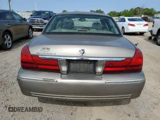 2005 Mercury Grand Marquis LS Premium z VIN 2MEFM75W65X609038, wystawiony jako Copart lot #55766005 z przebiegiem 132 136 mil mil oraz Szkoda całkowita • Salvage title. Historia ofert i sprzedaży dostępna na DreamBid. Obrazek 6.