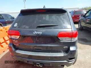 2015 Jeep Grand Cherokee Overland with VIN 1C4RJFCG6FC831641, listed as a IAAI auction lot 41877680 with 143,568 mi miles. Bid and sale history available at carsss.com. Image 16.