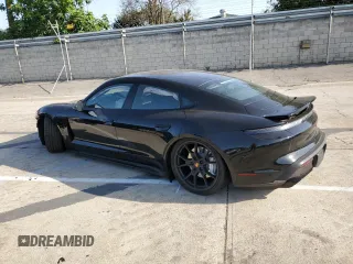 2022 Porsche Taycan GTS with VIN WP0AD2Y10NSA59551, listed as a Copart auction lot 36894013 with 5,593 mi miles and . Bid and sale history available at DreamBid. Image 2.