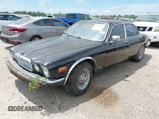 1982 Jaguar XJ with VIN SAJAV1248CC341050, listed as a IAAI auction lot 42653594 with Not provided miles and . Bid and sale history available at DreamBid. Image 17.