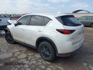2020 Mazda CX-5 Touring with VIN JM3KFACM9L0771919, listed as a IAAI auction lot 41527773 with 93,417 mi miles and . Bid and sale history available at DreamBid. Image 3.