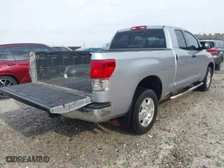 2010 Toyota Tundra 4WD Truck with VIN 5TFUW5F14AX145662, listed as a IAAI auction lot 41792711 with 241,445 mi miles. Bid and sale history available at carsss.com. Image 4.