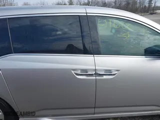 2013 Honda Odyssey Touring with VIN 5FNRL5H97DB021403, listed as a IAAI auction lot 41606606 with 223,547 mi miles. Bid and sale history available at carsss.com. Image 13.