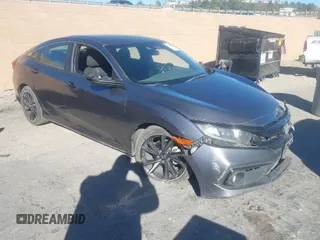 2019 Honda Civic Sport with VIN 2HGFC2F89KH582447, listed as a IAAI auction lot 41389206 with 106,125 mi miles and . Bid and sale history available at DreamBid. Image 1.
