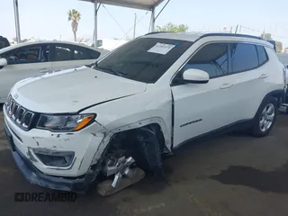 2020 Jeep Compass Latitude with VIN 3C4NJCBB8LT141375, listed as a IAAI auction lot 42382374 with 63,799 mi miles and . Bid and sale history available at DreamBid. Image 2.