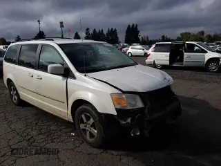 2010 Dodge Grand Caravan SXT with VIN 2D4RN5D11AR331804, listed as a Copart auction lot 73735873 with 183,923 mi miles and Salvage Title. Bid and sale history available at DreamBid. Image 10.