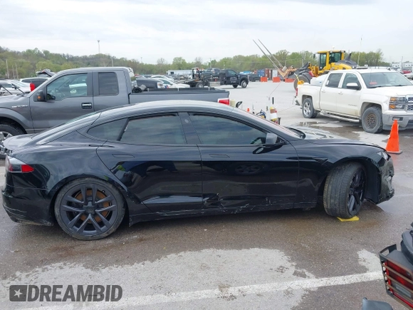 2022 Tesla Model S Plaid with VIN 5YJSA1E60NF460244, listed as a IAAI auction lot 41996403 with Not provided miles and . Bid and sale history available at DreamBid. Image 13.