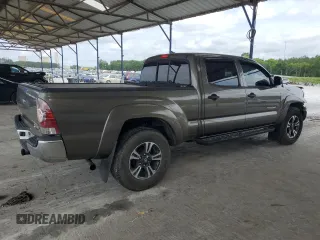 2009 Toyota Tacoma PreRunner with VIN 3TMKU72N89M021378, listed as a Copart auction lot 57142405 with 199,745 mi miles and Salvage title. Bid and sale history available at DreamBid. Image 3.