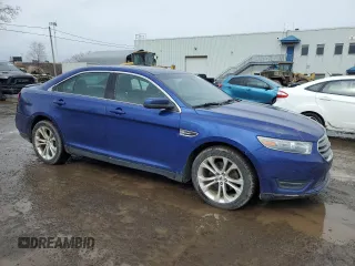 2013 Ford Taurus SEL with VIN 1FAHP2H80DG115530, listed as a Copart auction lot 50353005 with 194,515 mi miles and Salvage Title. Bid and sale history available at DreamBid. Image 4.