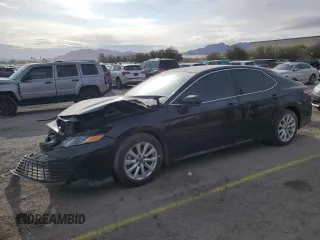 2019 Toyota Camry LE with VIN 4T1B11HK3KU774056, listed as a Copart auction lot 51497175 with 129,690 mi miles and Salvage Title. Bid and sale history available at carsss.com. Image 1.