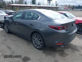 2025 Mazda 3 S Preferred with VIN 3MZBPACM8SM457113, listed as a IAAI auction lot 41938950 with 4,291 mi miles and . Bid and sale history available at DreamBid. Image 3.