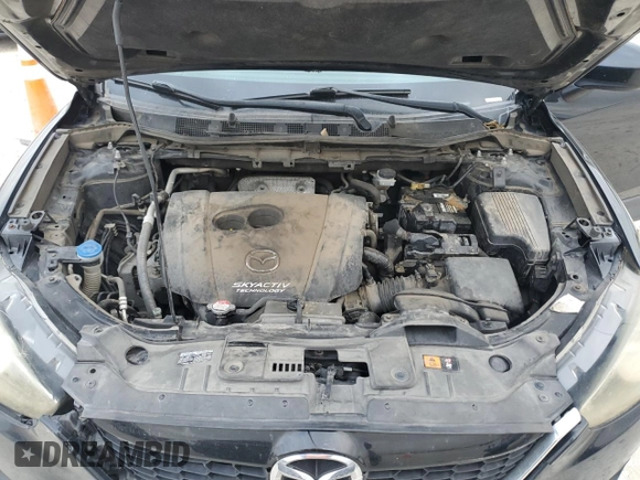 2015 Mazda CX-5 Touring with VIN JM3KE4CYXF0446370, listed as a Copart auction lot 52392575 with 132,419 mi miles and Salvage Title. Bid and sale history available at DreamBid. Image 12.