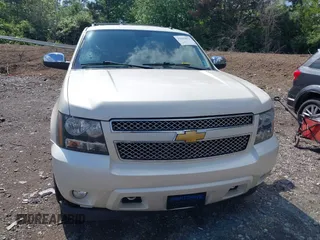 2013 Chevrolet Tahoe LTZ with VIN 1GNSKCE07DR326996, listed as a IAAI auction lot 42203073 with 147,067 mi miles and . Bid and sale history available at DreamBid. Image 12.
