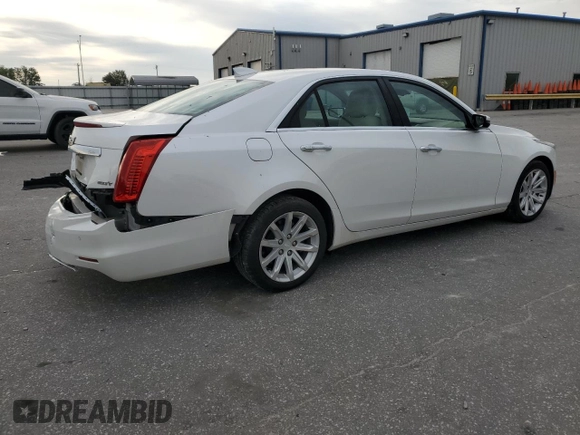 2015 Cadillac CTS Luxury RWD with VIN 1G6AR5SX1F0113369, listed as a Copart auction lot 68702294 with 56,895 mi miles and Salvage Title. Bid and sale history available at DreamBid. Image 3.