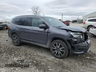 2022 Honda Pilot Touring 7-Passenger with VIN 5FNYF6H69NB033777, listed as a Copart auction lot 82638904 with 79,480 mi miles and Salvage Title. Bid and sale history available at carsss.com. Image 4.