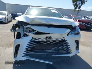 2024 Lexus RX 350h with VIN 2T2BBMCA2RC041498, listed as a IAAI auction lot 42267376 with 14,263 mi miles and . Bid and sale history available at DreamBid. Image 6.