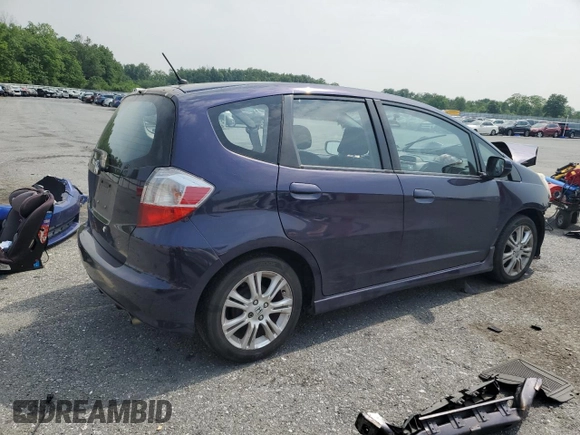 2009 Honda Fit Sport z VIN JHMGE88489S023368, wystawiony jako Copart lot #59741195 z przebiegiem 153 384 mil mil oraz Szkoda całkowita • Salvage title. Historia ofert i sprzedaży dostępna na DreamBid. Obrazek 3.