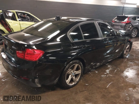 2013 BMW 3 Series 328i xDrive with VIN WBA3B3G53DNR80324, listed as a IAAI auction lot 41490385 with 177,026 mi miles and . Bid and sale history available at carsss.com. Image 4.