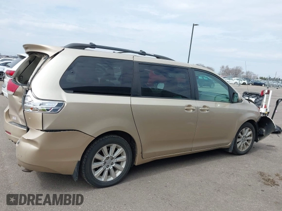 2013 Toyota Sienna XLE with VIN 5TDDK3DC4DS055796, listed as a IAAI auction lot 41993530 with 256,735 mi miles and . Bid and sale history available at DreamBid. Image 13.