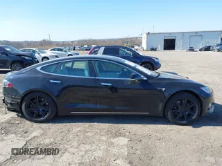 2020 Tesla Model S Long Range with VIN 5YJSA1E23LF381872, listed as a IAAI auction lot 41763046 with 96,720 mi miles and . Bid and sale history available at DreamBid. Image 14.