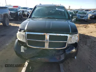 2009 Dodge Durango z VIN 1D8HD38K19F710373, wystawiony jako Copart lot #79876564 z przebiegiem Nie podano mil oraz Czysty tytuł • Clean title. Historia ofert i sprzedaży dostępna na DreamBid. Obrazek 5.