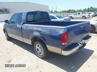 1998 Ford F-150 with VIN 1FTZX1725WKB57987, listed as a IAAI auction lot 42854030 with 210,471 mi miles and . Bid and sale history available at DreamBid. Image 3.