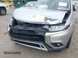 2020 Mitsubishi Outlander SE with VIN JA4AD3A39LZ034015, listed as a IAAI auction lot 42245374 with 92,992 mi miles and . Bid and sale history available at DreamBid. Image 6.