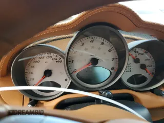 2006 Porsche Cayman S с VIN WP0AB29836U781908, выставлен на аукционе Copart как лот 74551144 с пробегом Не указан миль и Списание • Salvage title. История ставок и продаж доступна на DreamBid. Изображение 9.