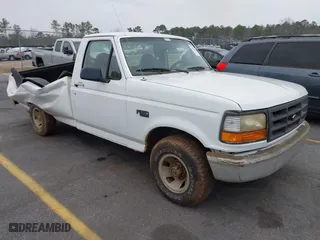 1996 Ford F-150 Special with VIN 1FTEF15Y0TLC18418, listed as a IAAI auction lot 41468561 with 167,001 mi miles. Bid and sale history available at carsss.com. Image 1.