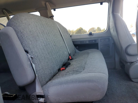 2010 Ford Econoline Passenger XL with VIN 1FMNE1BW3ADA25124, listed as a Copart auction lot 56899235 with 244,010 mi miles and Salvage title. Bid and sale history available at DreamBid. Image 11.