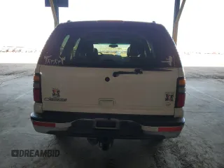 2006 Chevrolet Tahoe LT z VIN 1GNEC13Z26R130659, wystawiony jako Copart lot #59989895 z przebiegiem 279 937 mil mil oraz Szkoda całkowita • Salvage title. Historia ofert i sprzedaży dostępna na DreamBid. Obrazek 6.