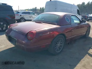 2004 Ford Thunderbird Deluxe with VIN 1FAHP60A34Y110824, listed as a IAAI auction lot 42155374 with 77,042 mi miles. Bid and sale history available at carsss.com. Image 4.