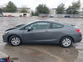 2012 Honda Civic Cpe LX with VIN 2HGFG3B58CH505205, listed as a IAAI auction lot 41877775 with 91,511 mi miles. Bid and sale history available at carsss.com. Image 14.