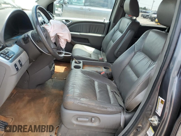 2010 Honda Odyssey EX-L z VIN 5FNRL3H71AB029236, wystawiony jako Copart lot #55183165 z przebiegiem 315 604 mil mil oraz Szkoda całkowita • Salvage title. Historia ofert i sprzedaży dostępna na DreamBid. Obrazek 7.